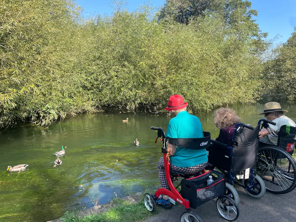 Care home residents Maz, Phyllis and Alison by the river