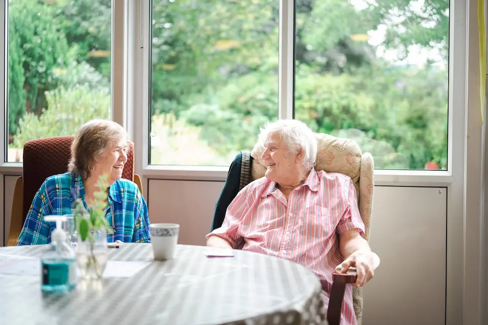 Elderly couple laughing amongst themselves