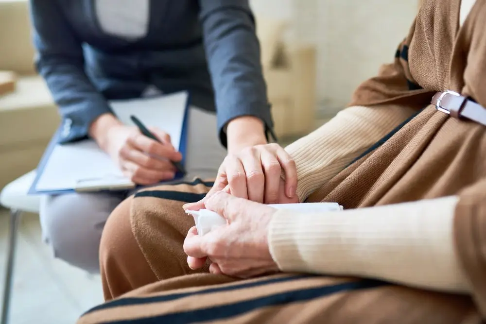 Female psychologist providing support to her patient