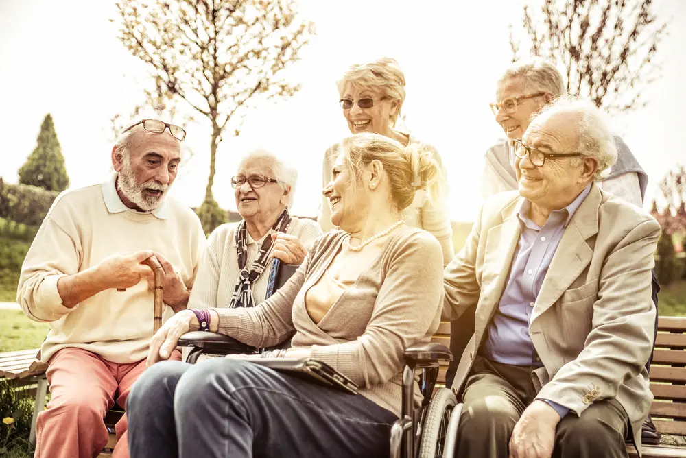 Group of older adults socialising together
