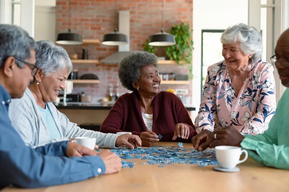 Older adults doing a jigsaw