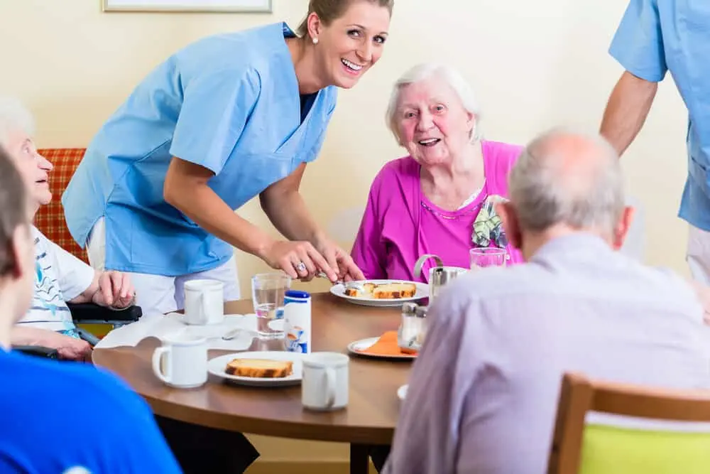 Older adults eating in a care home