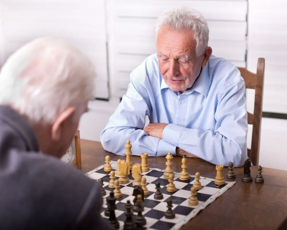 Older adults playing chess