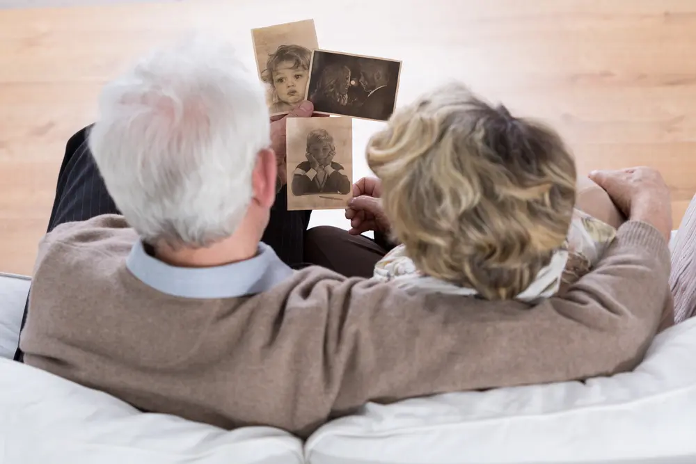 Older couple looking at photos together