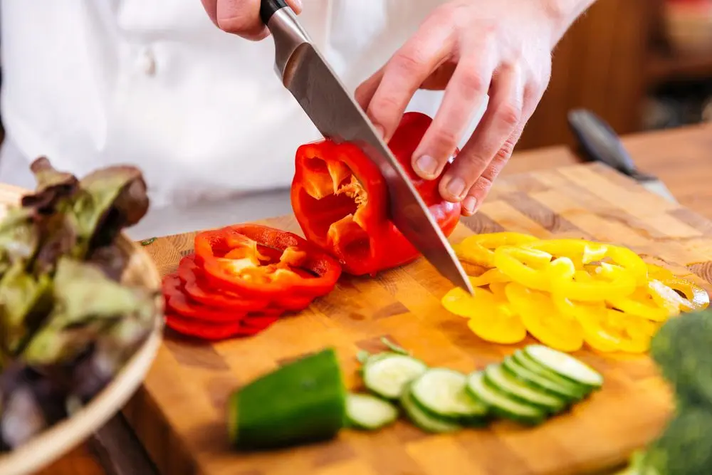 Person preparing vegetables
