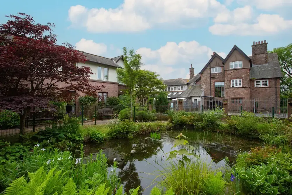 St George's Care Home garden, pond, and exterior