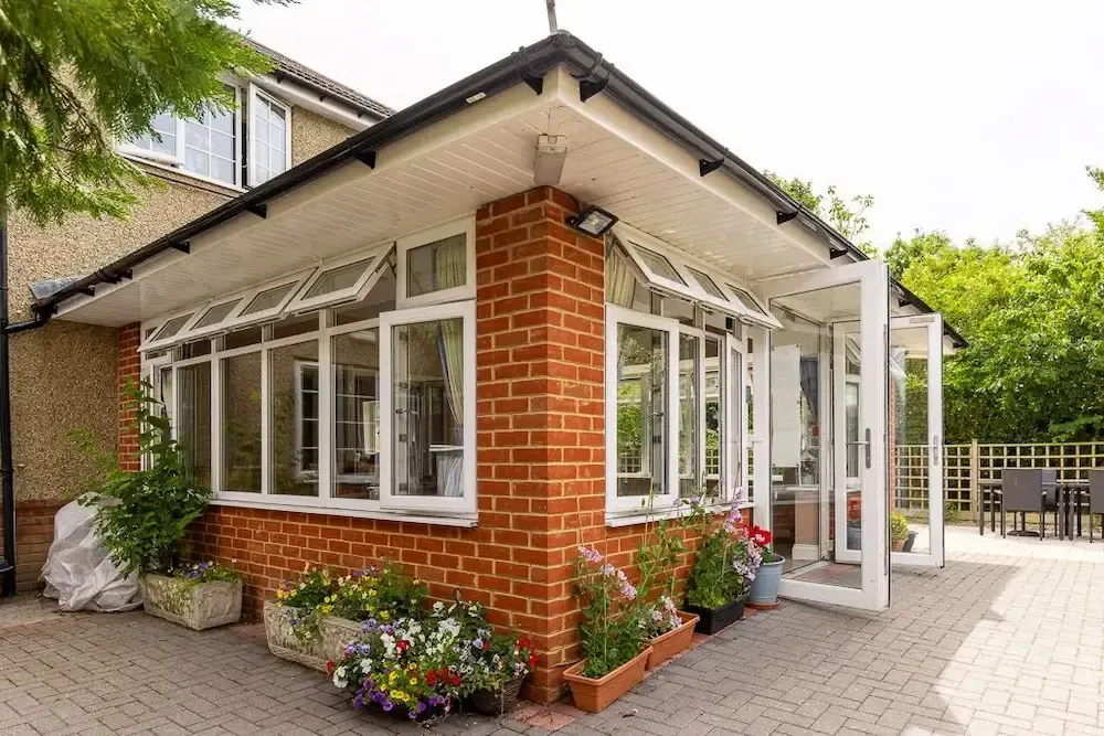 The Oast Care Home patio and exterior