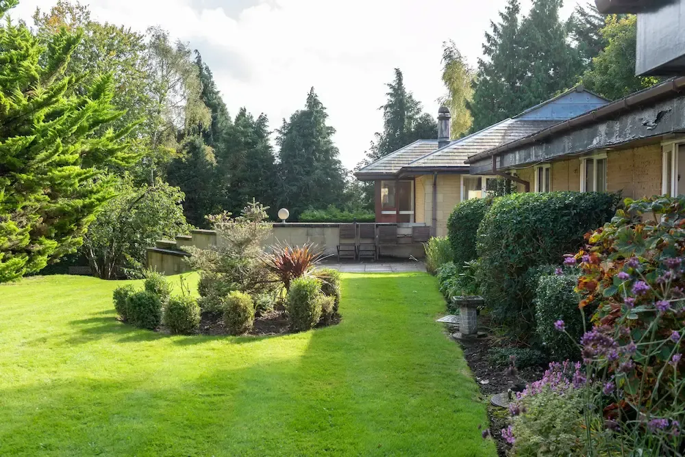 The Poplars Care Home garden and exterior