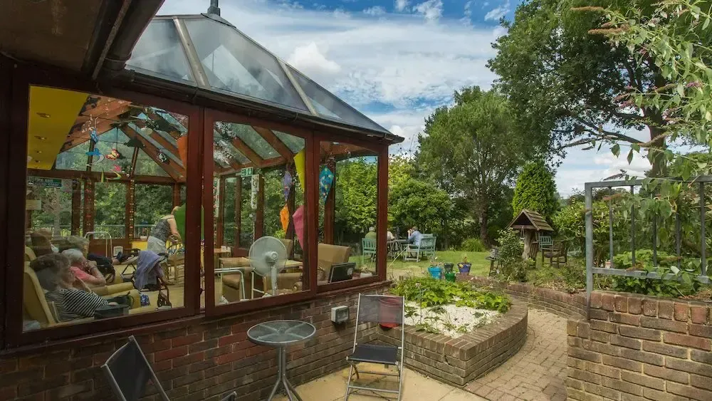 The Priory Care Home garden and conservatory