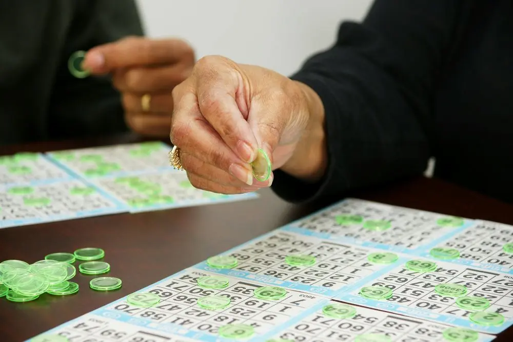 Two people playing bingo